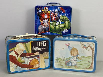 3 Vintage Lunch Boxes - 1970's: All metal. Thermos 1973 UFO Lunchbox, Thermos 1969 Precious Moments & Marvel Avengers Assembly. 2 measure: 6.75"h x 8.25"w x 4"d. 1 @ 6"h x 7.75"w x 2 7/8"d. 3 lbs. total.