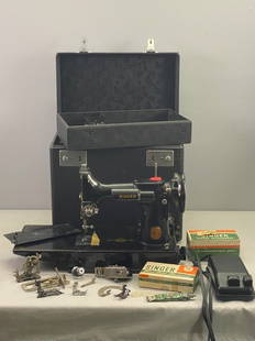 Singer Featherweight 221: Serial # AG539959. In carrying case. Includes Blind Stitch attachment. Runs, cover for left side of machine is missing - see photo.