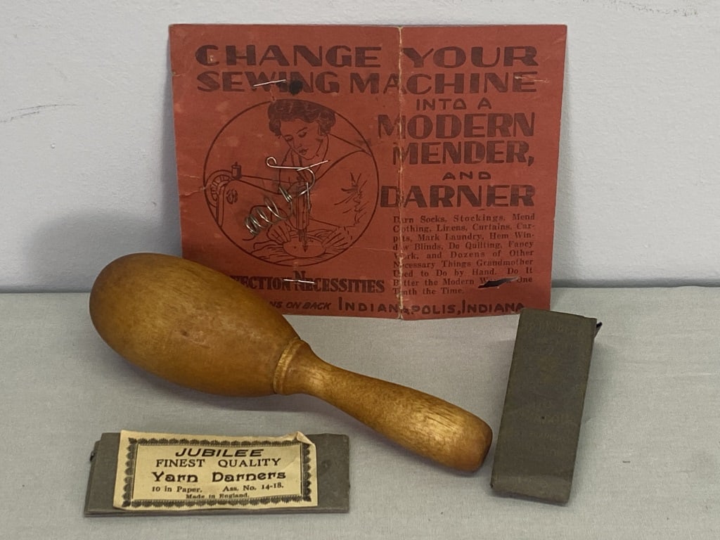 1930's Darning Items: Darning needles, egg, and sewing machine attachment.