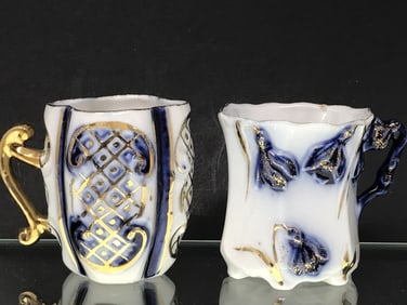 Two Miniature Blue, White & Gold Cups