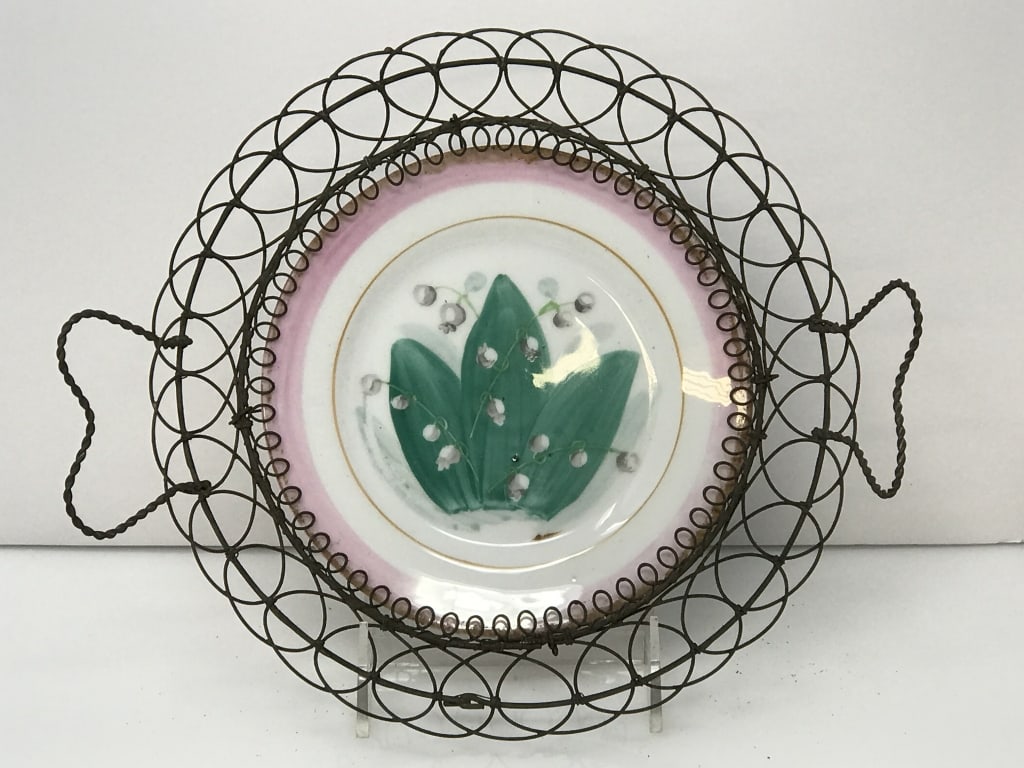 Wire Bun Basket with Lilly of the Valley Plate: Wire Bun Basket with Lilly of the Valley Decorated Plate. Plate 6.25"d, Basket 9"d. 8 oz.