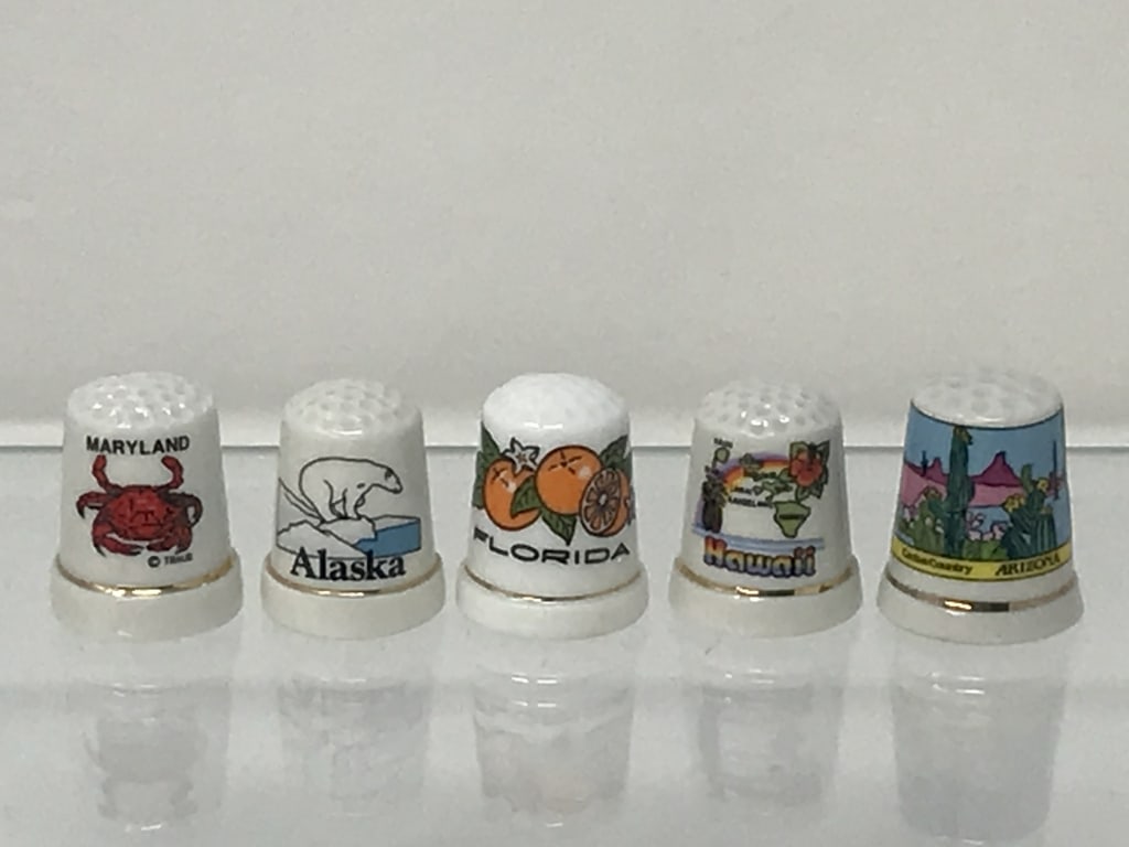 State Thimbles (5): 5 State Thimbles. Arizona, Alaska, Florida, Hawaii, Maryland. 1.25"h. 1.6 oz.