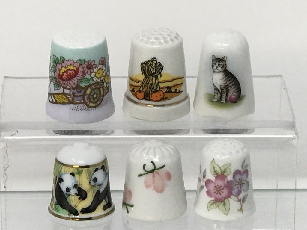 Thimbles of Miscellaneous Origin (6): Thimbles of Miscellaneous Origin (6) unmarked decorative. 1" - 1.25"h. 1.5 oz.