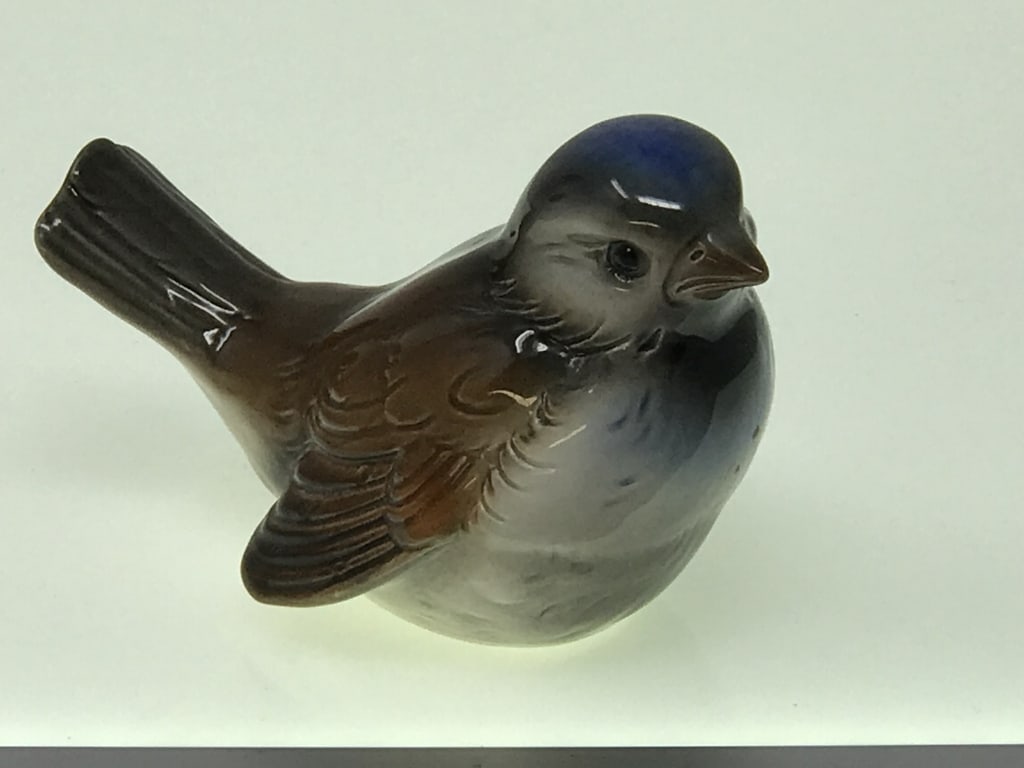 Goebel Sparrow Figurine: Goebel, Germany Sparrow Figurine. 2.75"h x 4"d x 2.5"w. 2.7oz.