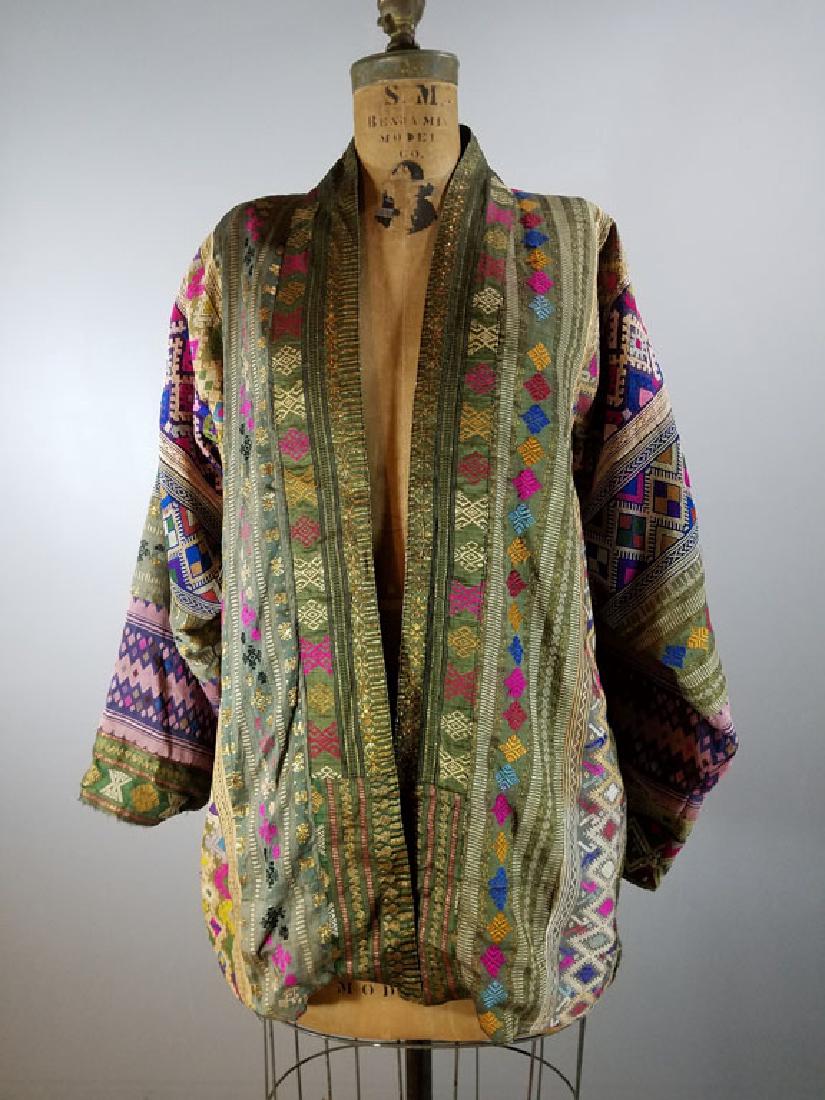 Vintage Ethnic Jacket: Size Medium/L needs repair on hem, left sleeve.