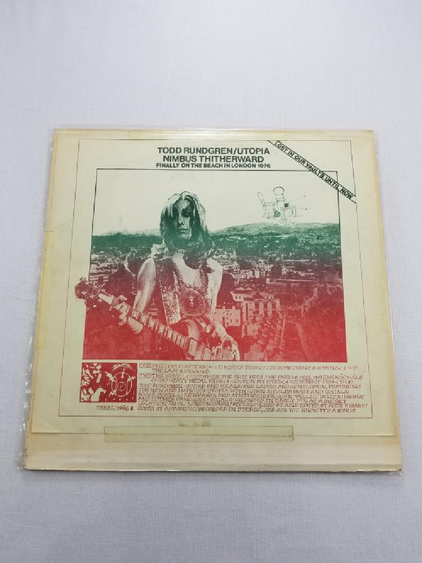 TODD RUNDGREN/UTOPIA "Finally on the Beach": IN LONDON TAKRL 1996 VG+/- Condition. Photos represent condition statement. Please see auction description for link to higher resolution photos. Vinyl Records, LP, Vintage Records