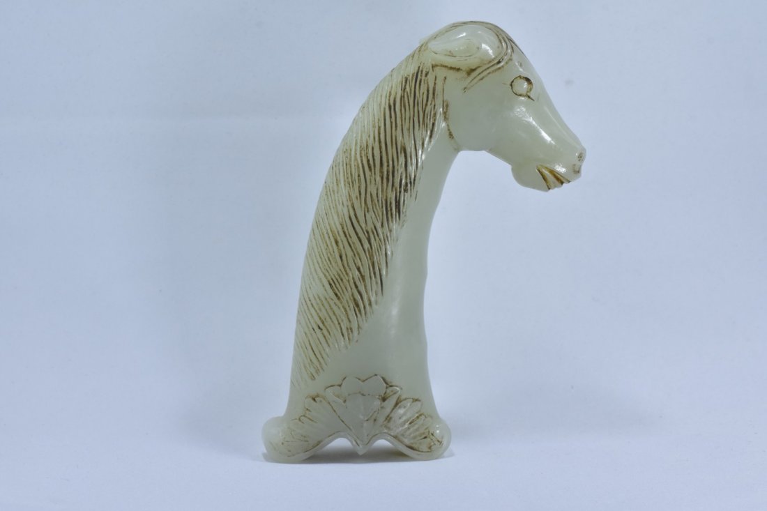 A GOOD MUGHAL STYLE JADE HORSE DAGGER (1 of 10)