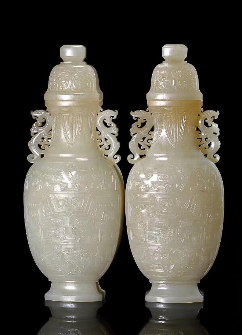 A PAIR OF HETIAN JADE VASES Feb 20, 2018 Harvard's Auction in MA