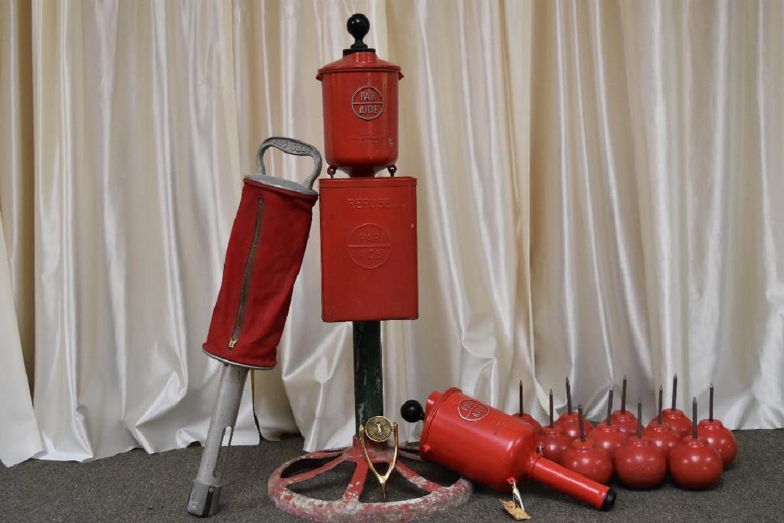 Gordy Golf Equipment Including Vintage Par Aide: Golf Equipment Including Vintage Par Aide. Two Par Aide Golf Ball Washer Master, With Base and Refuse Collector. Capacity 5 Pints. Satellite Tee Markers, 11 Count. "Next Tee" Directional Signs, With S