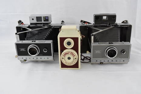 Three Vintage Cameras, One Colorflex, Two Polaroid.: Color Flex Dual Lens Camera by Monroe Sales Co, Circa 1950. Polaroid Land Camera 240 Circa 1967. Polaroid Land Camera 250 Circa 1967. Motown Mansion Collection, 918 West Boston Blvd. Detroit
