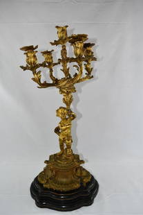 Antique Cherub Gilt Bronze Candelabra: Antique Cherub Gilt Bronze Candelabra Motown Mansion Collection, 918 West Boston Blvd. Detroit Michigan 48202. Purchased From Berry Gordy. Weight: 28lbs Dimensions: 31" x 15" x 10" As