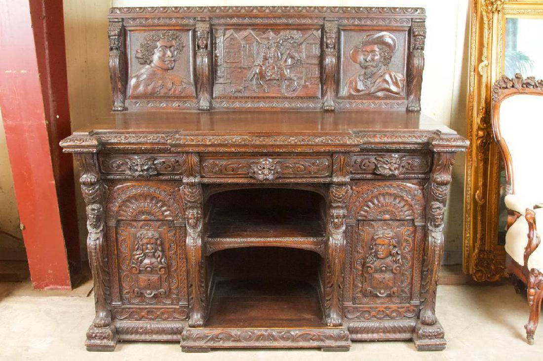 Renaissance Scrollwork Sideboard Cabinet - Escape of: 60 x 27 x 56, Wood. Antique Renaissance carved sideboard cabinet. Ornately detailed woodwork depicts the Escape of Charles II in three hand carved reliefs. Body of the cabinet contains more detailed c