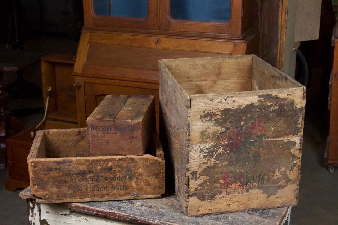 Rustic Wooden Crates: Various Sizes, Wood. Set of three rustic wooden crates. Feature some branding, logos and paint. In like found condition.