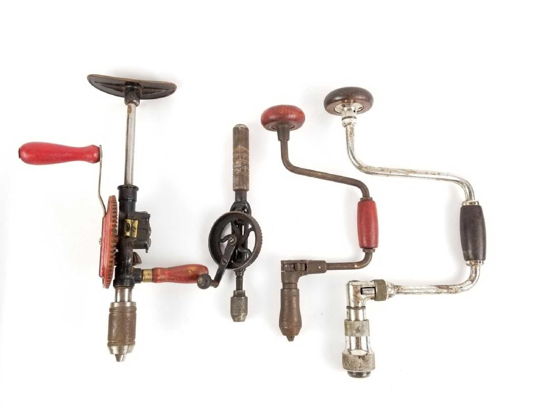 Four Antique/Vintage Hand Drills: Mixed metals Four hand drills. Two hand cranked, gear driven. Two hand braced. In like found, working condition.