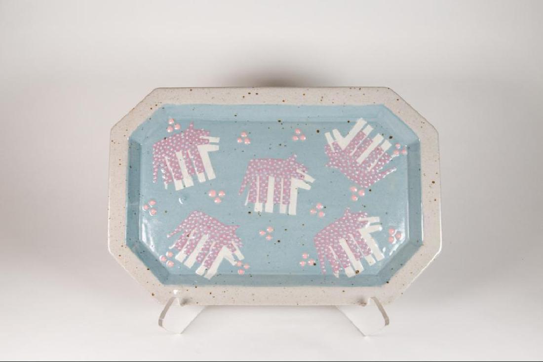 Cunningham Abstract Dog Platter: Cunningham Abstract Dog Platter. Glazed with a light blue and designed with contemporary dog designs on the interior of the platter. Good condition. 15"W x 10"D x 1"H