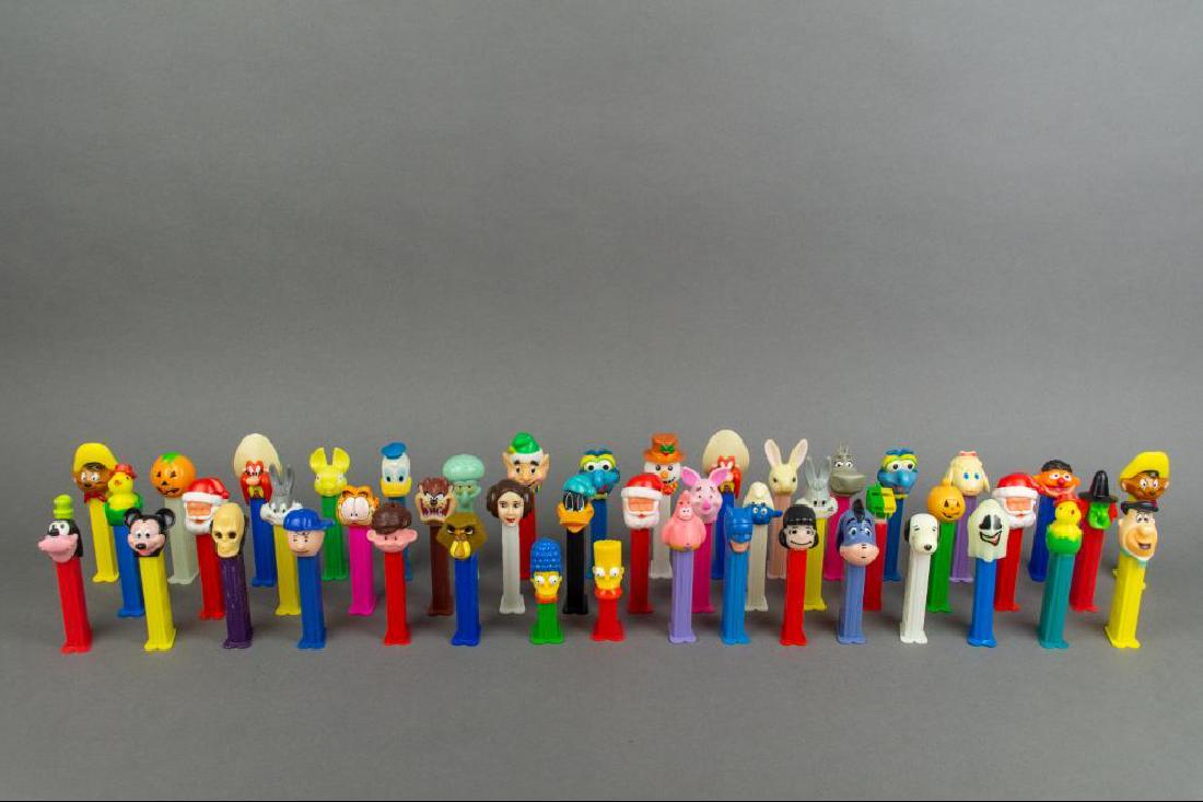 Lot Forty-Seven (47) Vintage and Modern Pez Dispenser: Lot Forty-Seven (47) Vintage and modern Pez dispensers. Condition consistent with age and use.