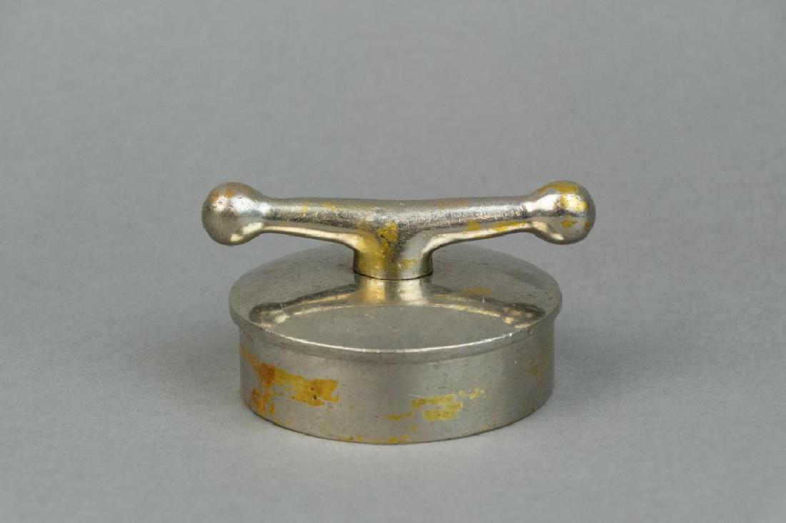 Dog Bone Radiator Cap: Dog bone radiator cap. 4"D x 1" H