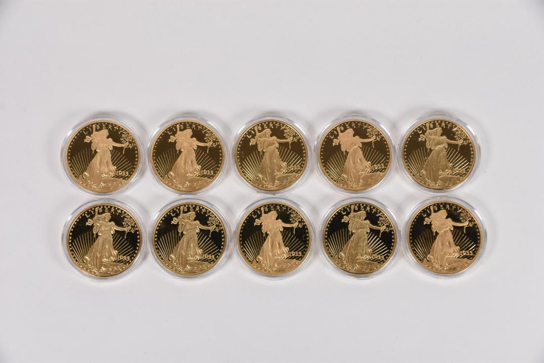 Ten (10) 1933 Double Eagle Proof Set: Collection of ten (10) 1933 Double Eagle Proof Set. National collectors mint .999 silver proof set layered in 24k gold. COA is provided.