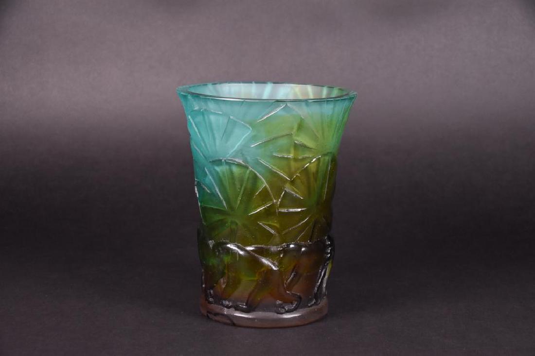 Daum Crystal Monkey Vase: Daum Crystal Monkey Vase, the upper body molded with tropical palms in shades of greenish blue, above an amber colored troupe of monkeys. Signed. 4 4/3" Diameter; 6"Height