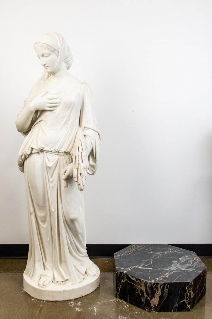 Four Seasons "Summer" Marble Statue: Four Seasons "Summer" Marble Statue. White marble statue of woman carrying wheat, carved with excellent details. Dark Marble base. 20" Width; 56" Height