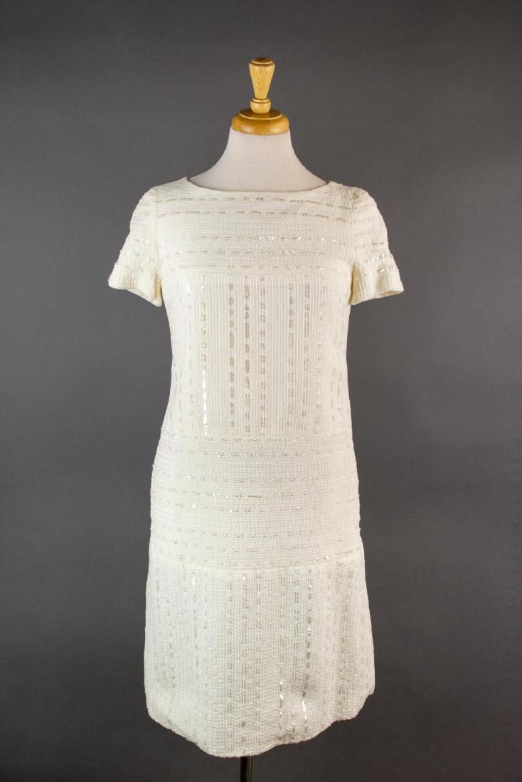 Chanel Indentification Sequin Dress: Chanel Indentification Sequin Dress. Hidden zipper on back with eyelet button on top. Measurements: Bust: 32", Waist: 34", Length: 38", Shoulder: 15", Sleeve length: 7".