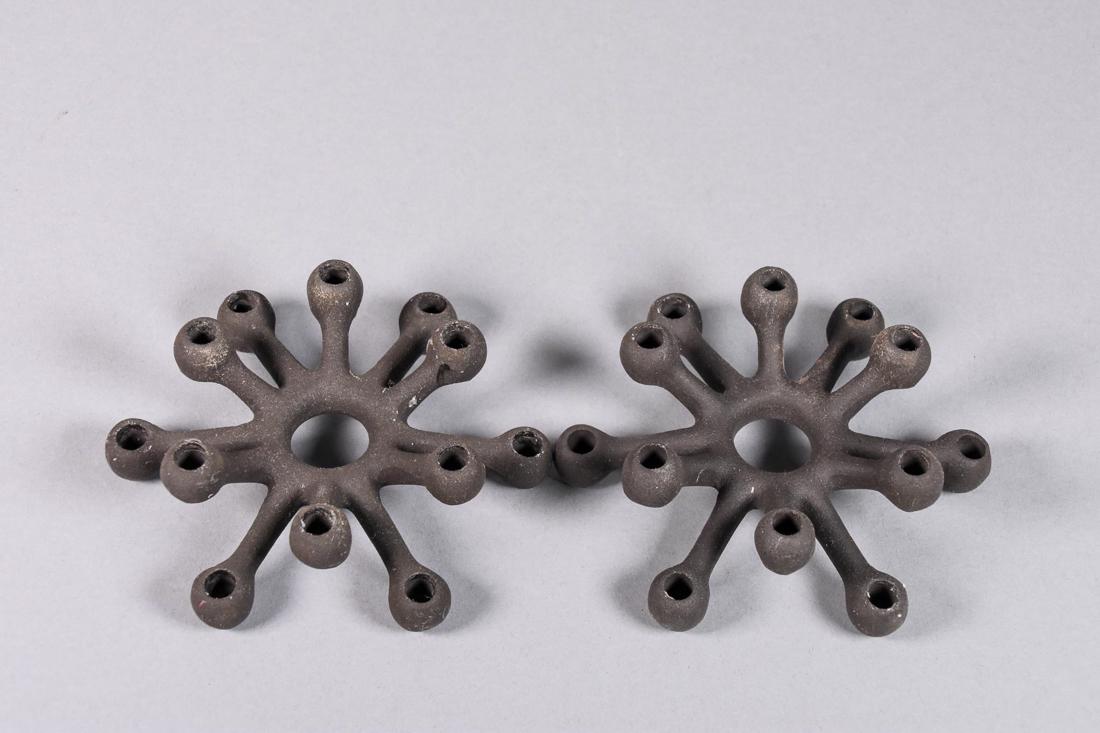 Jens Quistgaard for Dansk Iron Candle Holders: Pair of Jens Quistgaard for Dansk iron candle holders. Each candle holder can hold twelve (12) candlesticks with the original boxes. CREATOR: Dansk (Manufacturer) Jens Quistgaard (Designer). PLACE OF