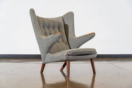 Hans J. Wegner "Papa Bear" Chair: A rare find-all original Hans Wegner papa bear chair. CREATOR: Hans J. Wegner (Designer). PLACE OF ORIGIN: Denmark. CONDITION: Poor. CONDITION DETAILS: Original fabric has tears through out.