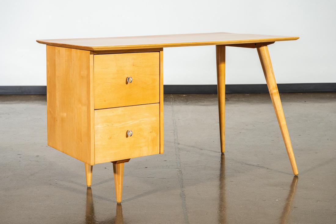 Paul McCobb Desk for Planner Group in Solid Maple,: This exceptional early desk was designed by Paul McCobb and produced by Planner Group. Executed in solid maple, angular tapered legs and two desk drawers. CREATOR: Paul McCobb (Designer), Planner Grou