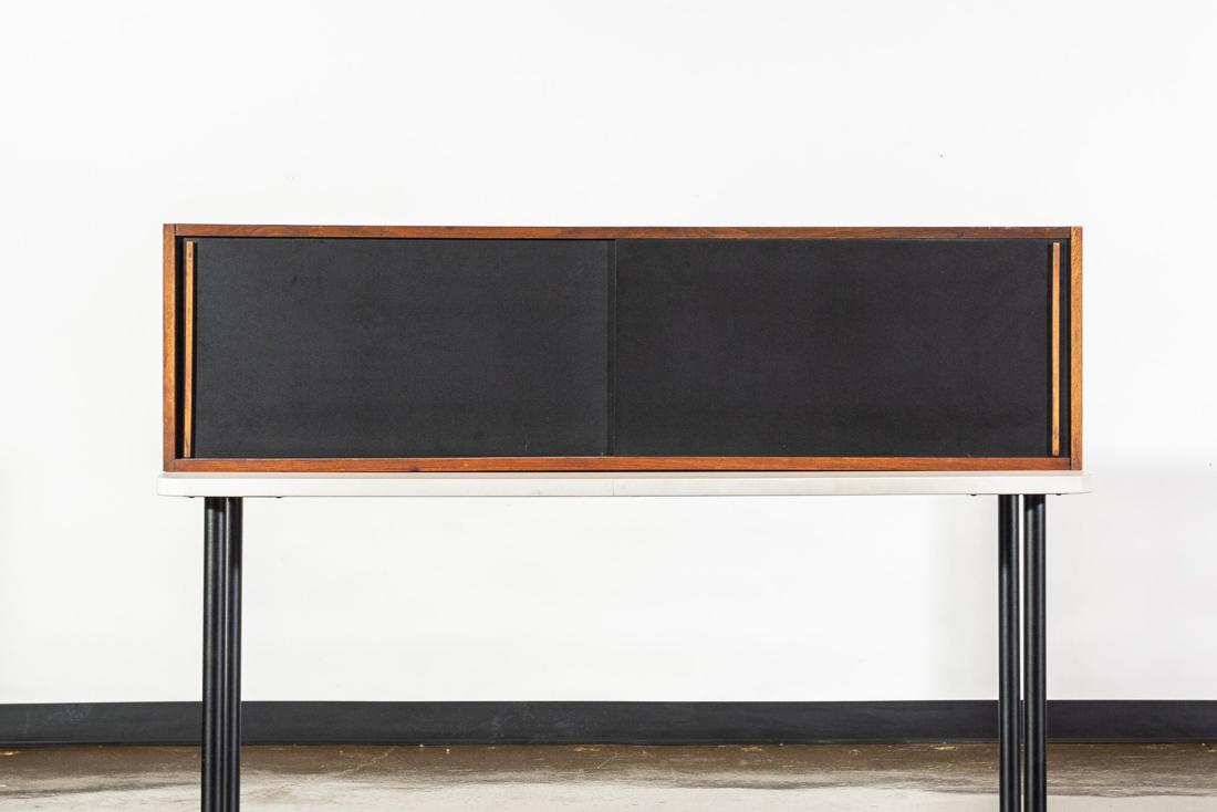 Attr. Poul Cadovius Floating Credenza Cabinet: Attr. Poul Cadovius Floating Credenza Cabinet. CONDITION: Good. Minor wear around edges. Refer to photos for condition. MEASUREMENTS: H 16in. x W 60in. D 10in. A portion of this sale benefit the 