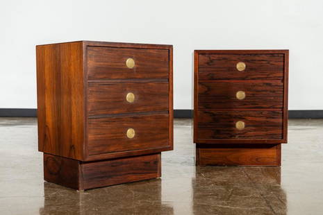 Pair of Dyrlund-Smith Modern Rosewood Nightstands: Dyrlund (Danish, est. 1960). Wood, veneer, brass. c. 1960's-70's. Distributed by Smith Contemporary Furniture. Nightstands feature rosewood veneer and hardwood with brass circular pulls by Dyrlund.