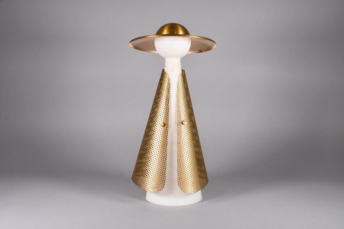 Mid Century Modern Lady Figurine Lamp: Mid Century Modern brass mesh lamp with opal glass in the figure of a lady, topped with a brass and enamel hat. ARTIST: Unknown. DATE: 1950's-1960's. CONDITION: Good vintage condition. CONDIT