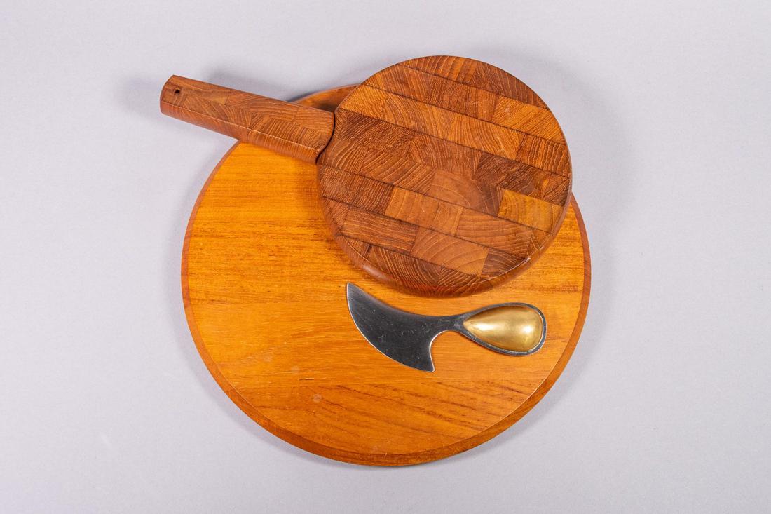 Designer Cheeseboards with Knives for Dansk: Set of Two (2) Dansk cheeseboard and knife sets. One set is designed by master jeweler and silversmith Vivianna Torun Bulow-Hube. An impressive serving piece for cheese and charcuterie, complete with