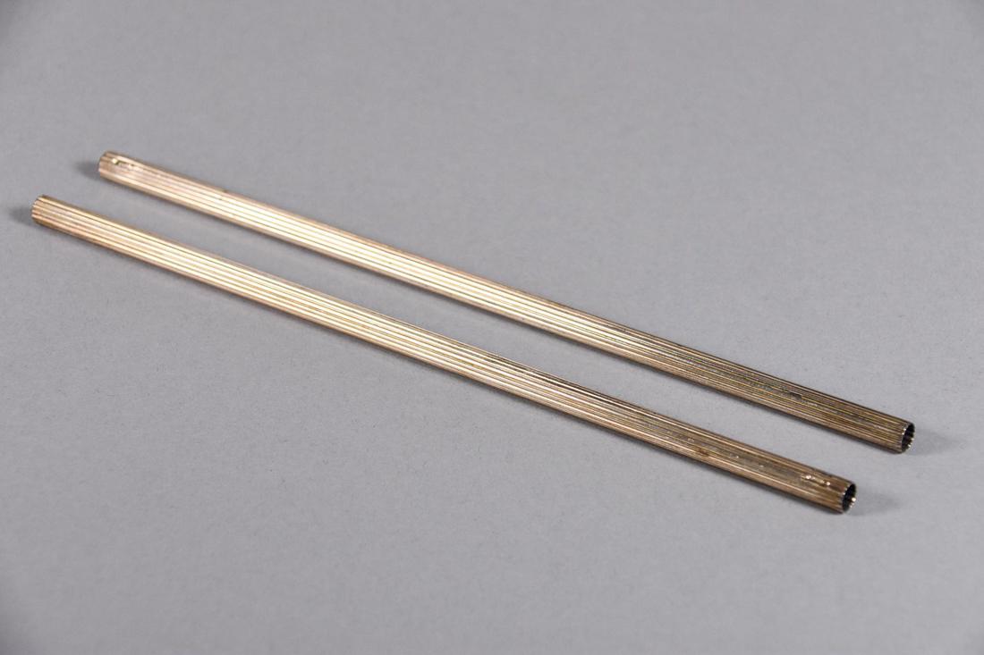 Tiffany & Co. Sterling Silver Straws: Pair of vintage Tiffany & Co. sterling silver straws with original box and cloth.CREATOR: Tiffany & Co. METAL: Sterling Silver. MEASUREMENTS: 8" long. MARKED: "Tiffany & Co." and "St