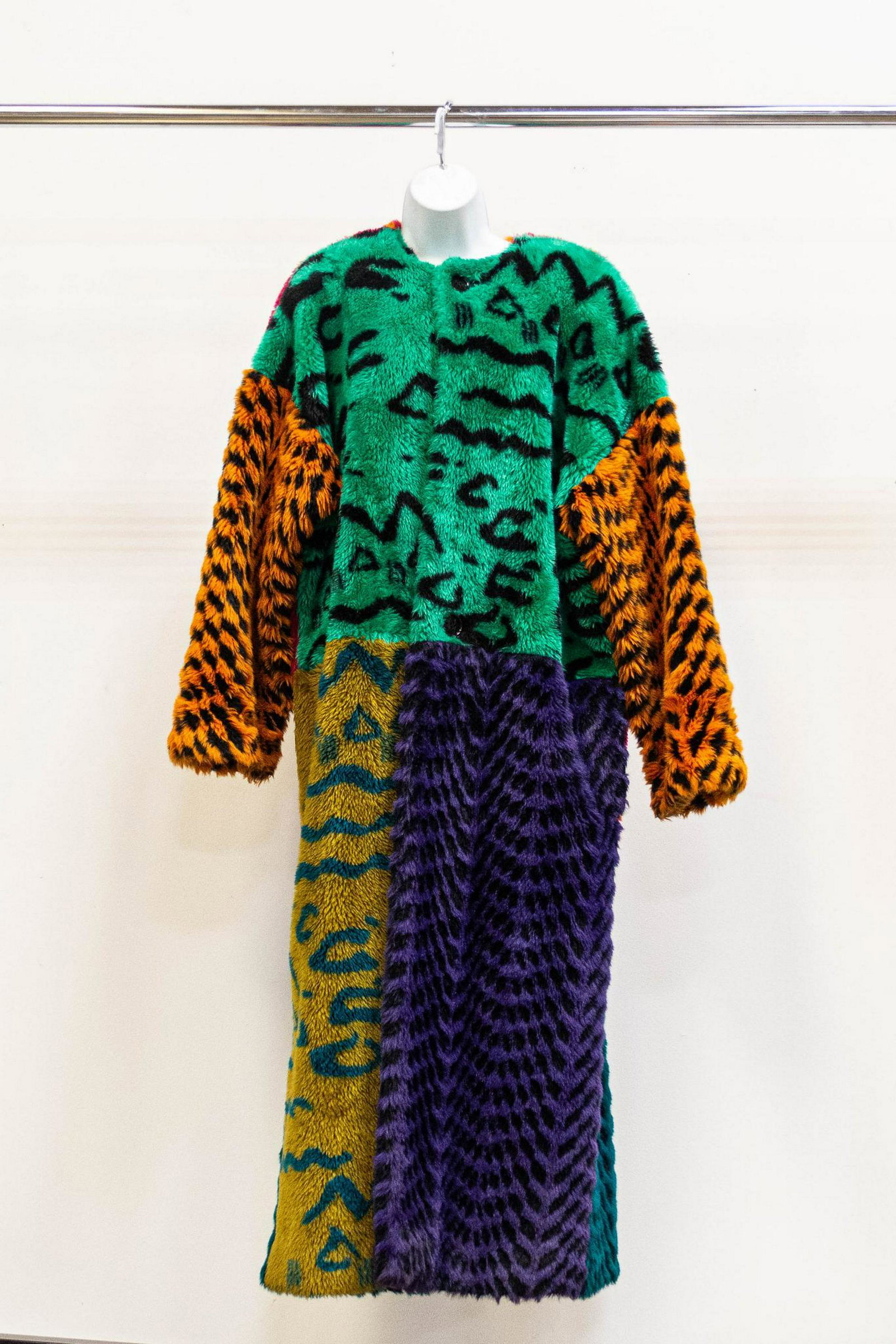 Bette Appel Multi-Colored Full Length Faux Fur Swing: Multi-colored full length Bette Appel faux fur swing coat. DESIGNER: Bette Appel CONDITION: Very good, pre-owned MEASUREMENTS: Bust: 26" Waist: 25" Shoulder: 23" Length: 53" Sleeves: 24"