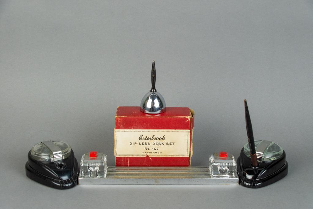 Lot Four (4) Inkwells and Bell: Lot Four (4) Inkwells and bell. Includes: Two (2) Esterbrook Dip-Less Desk Set with original box and instructions with an American Pencil Co. Ink Pen. One (1) Art Deco chrome tray with two glass inkwe