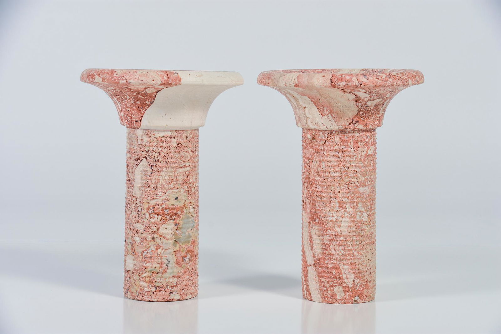 Pair of Marble Travertine Made In Italy Candle Holders: Pair of Marble Travertine Made In Italy Candle Holders. H9.75" x W7" Good vintage condition NAVIS Pack and Ship will be handling the shipping of all items from this auction. Go to: http://blockauction