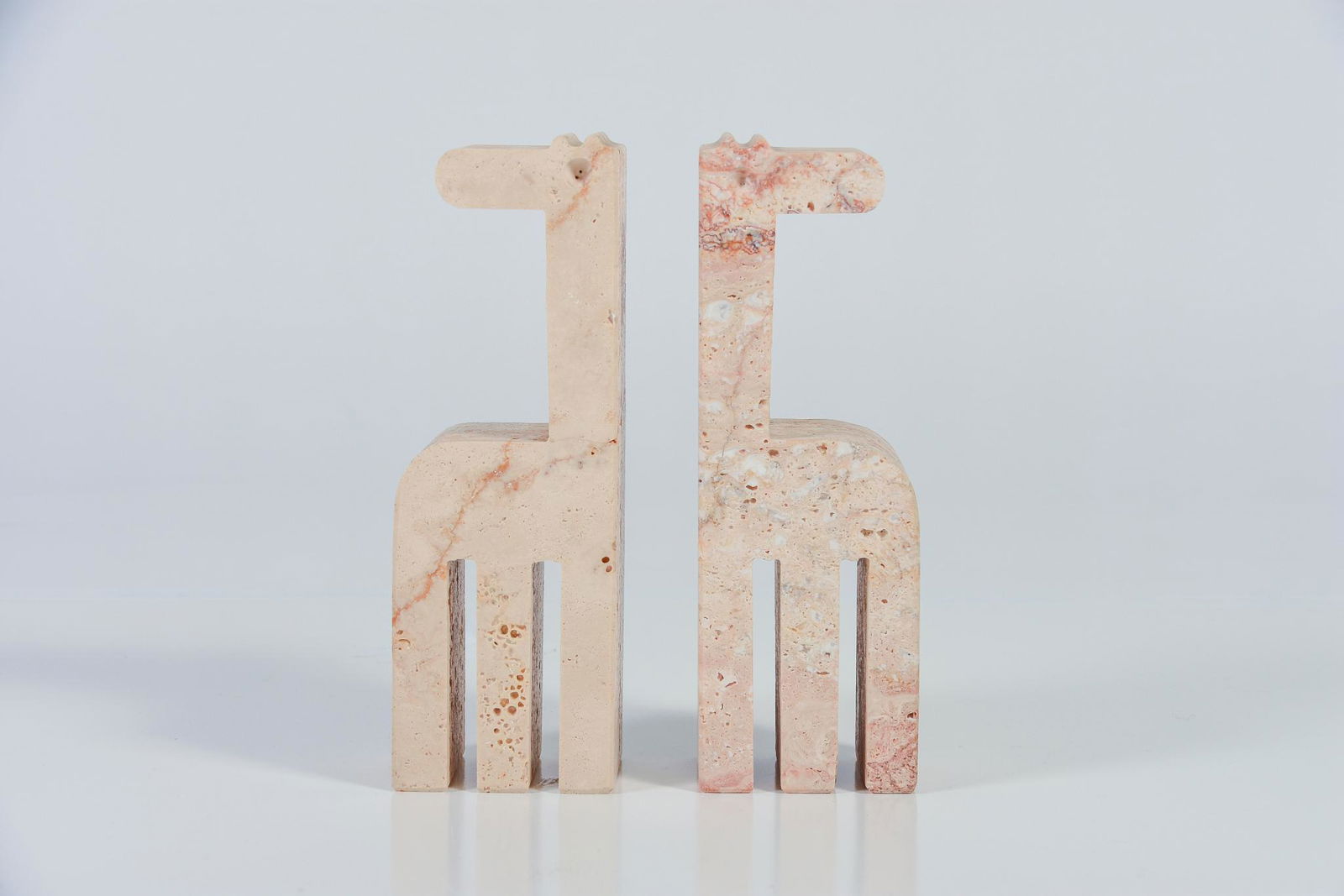Vintage Pair Mid Century Modern Marble Travertine Made: Vintage Pair Mid Century Modern Marble Travertine Made In Italy Giraffes. H9.5" x W3.25" x D2.5" Good vintage condition NAVIS Pack and Ship will be handling the shipping of all items from this auction