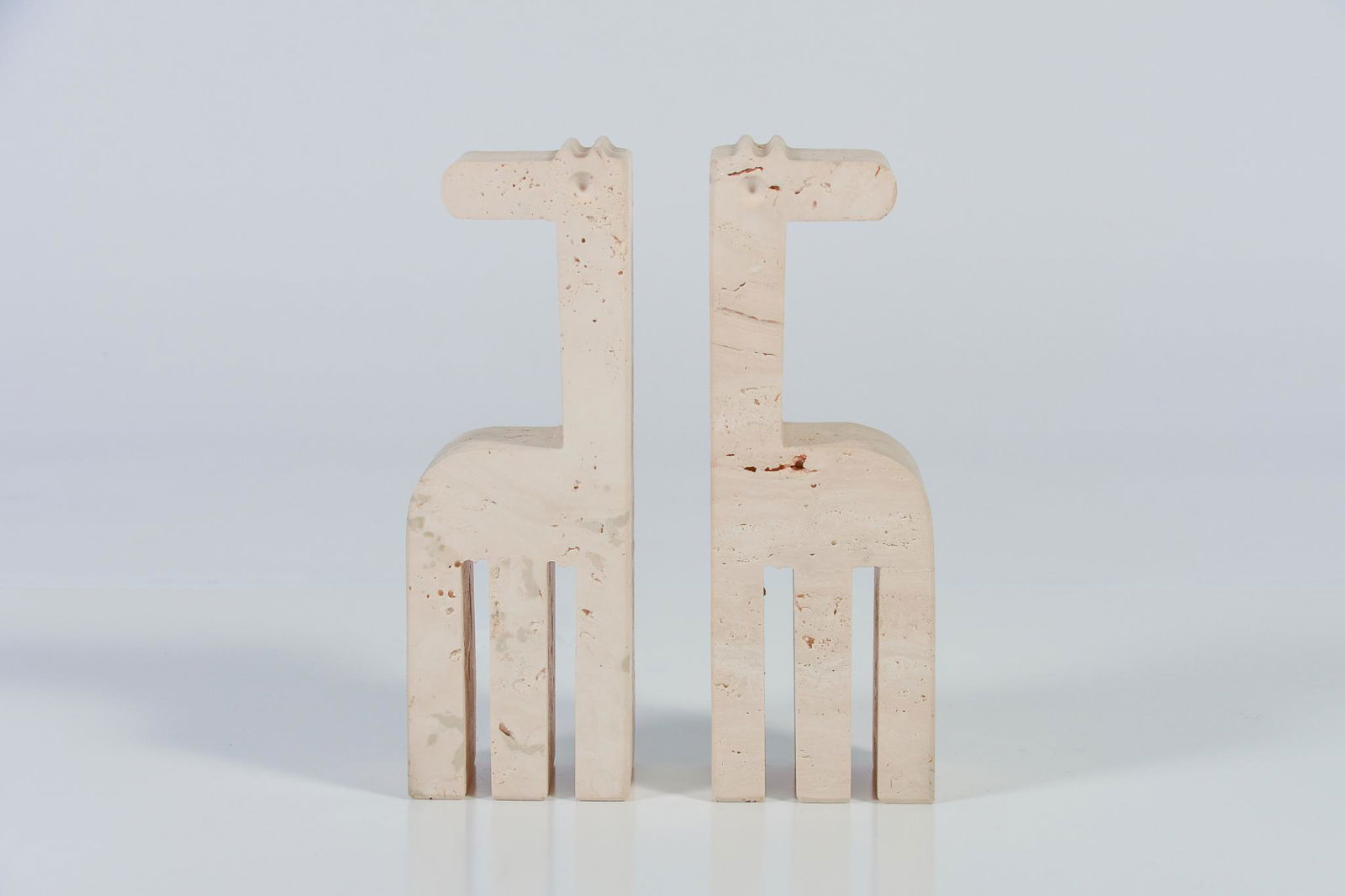 Vintage Pair Mid Century Modern Marble Travertine Made: Vintage Pair Mid Century Modern Marble Travertine Made In Italy Giraffes. H9.5" x W3.25" x D2.5" Good vintage condition NAVIS Pack and Ship will be handling the shipping of all items from this auction