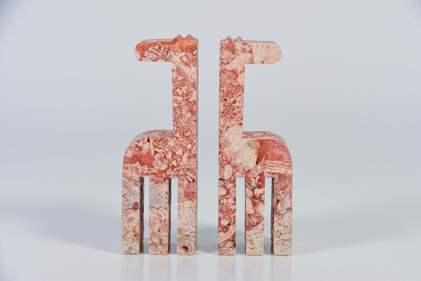 Vintage Pair Mid Century Modern Marble Travertine Made: Vintage Pair Mid Century Modern Marble Travertine Made In Italy Giraffes. H9.5" x W3.25" x D2.5" Good vintage condition NAVIS Pack and Ship will be handling the shipping of all items from this auction
