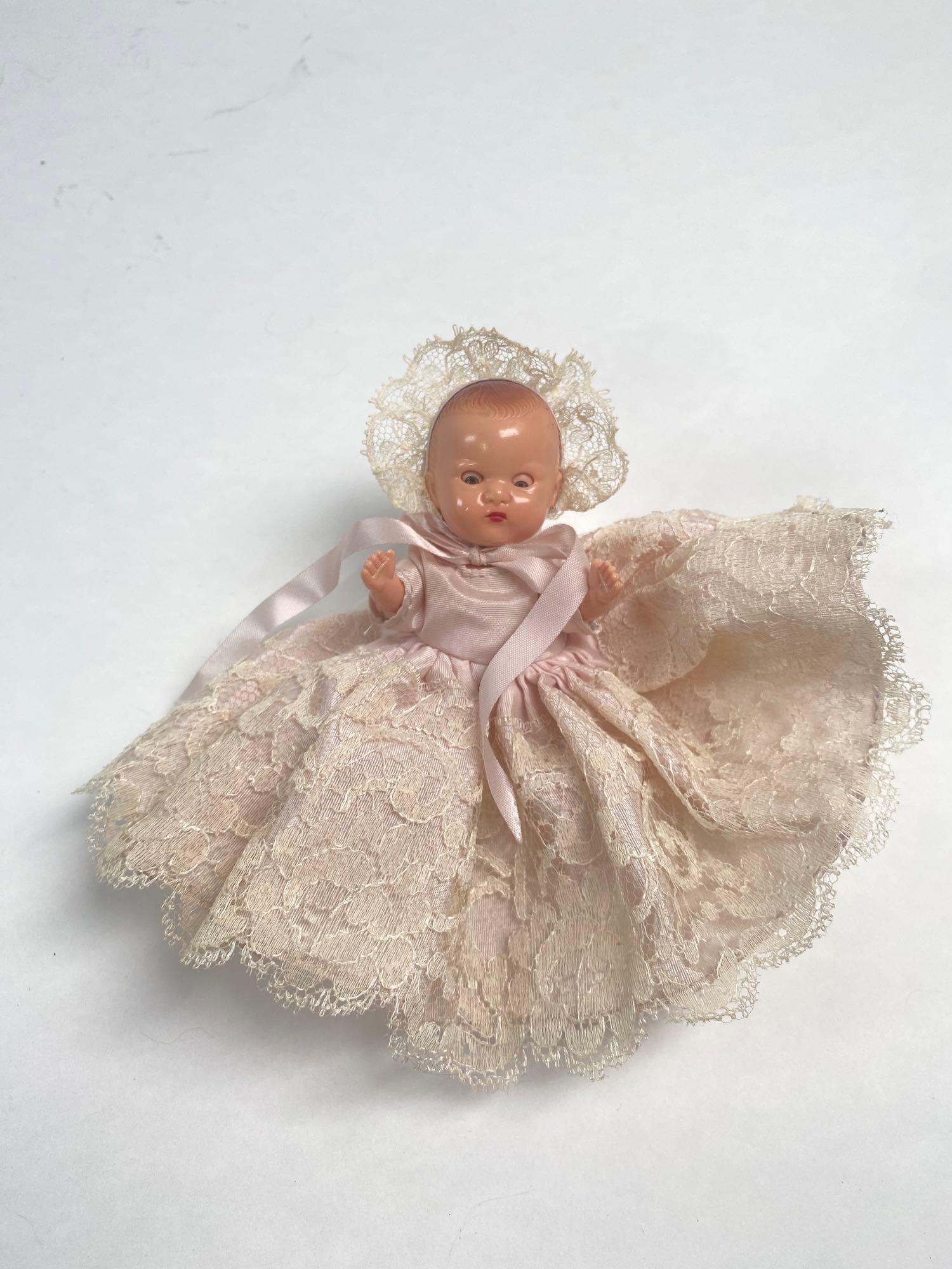 Rock-a-bye baby Hollywood doll and star- 1950': Rock-a-bye baby Hollywood doll and star- 1950's 4 inch hard plastic