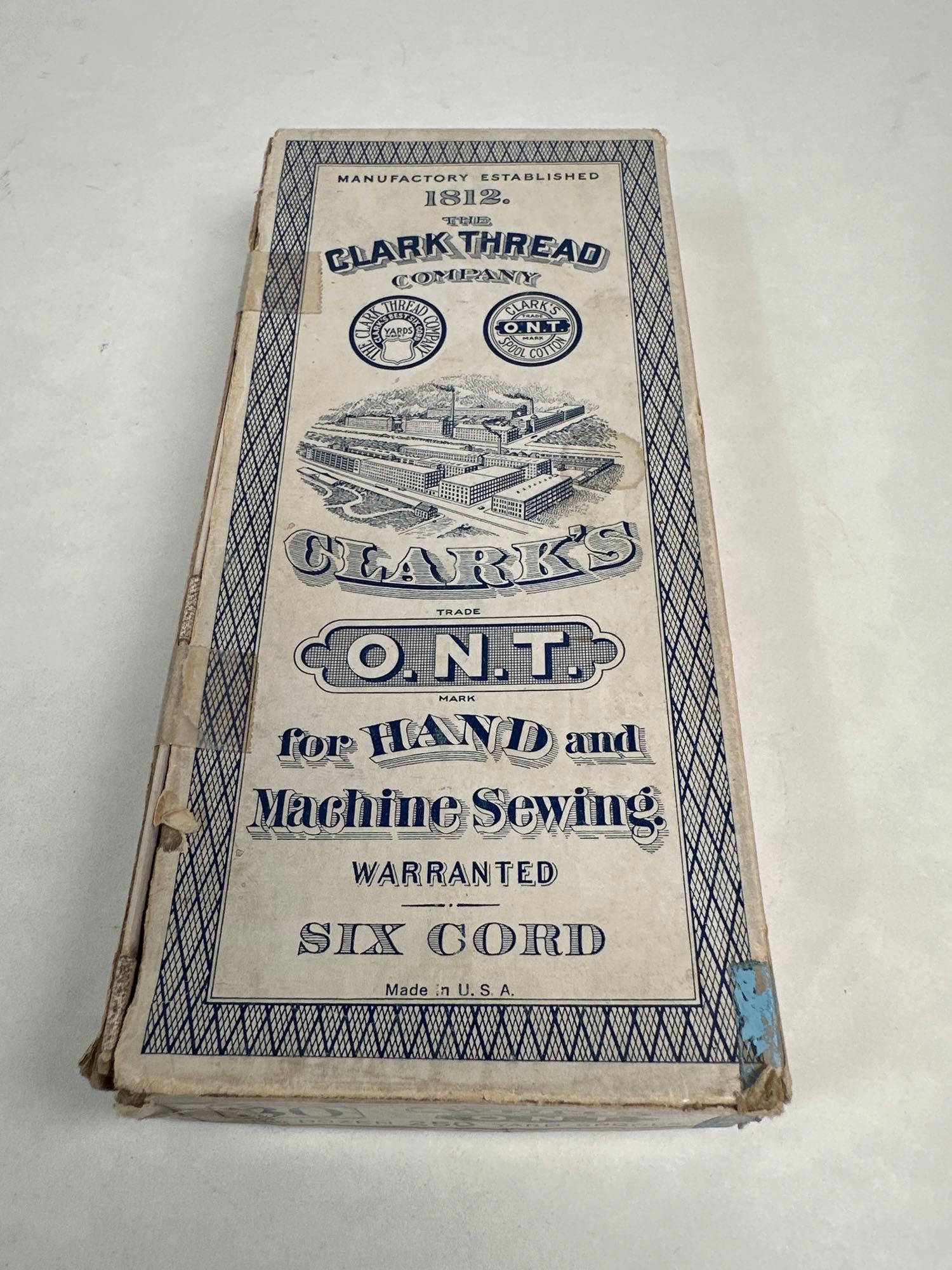 Paper doll cutouts in Clark thread box. (1 of 2)