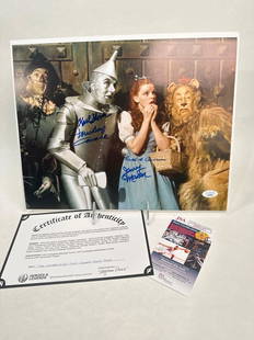 The Wizard of Oz cast signed/autographed movie photo 11 x 14 COA: The Wizard of Oz cast signed/autographed movie photo 11 x 14 COA. JSA JJ95187.Signers: Mickey Carroll, Donna Stewart HArdway, Karl Slover, Jerry Maren, Ruth Duccini