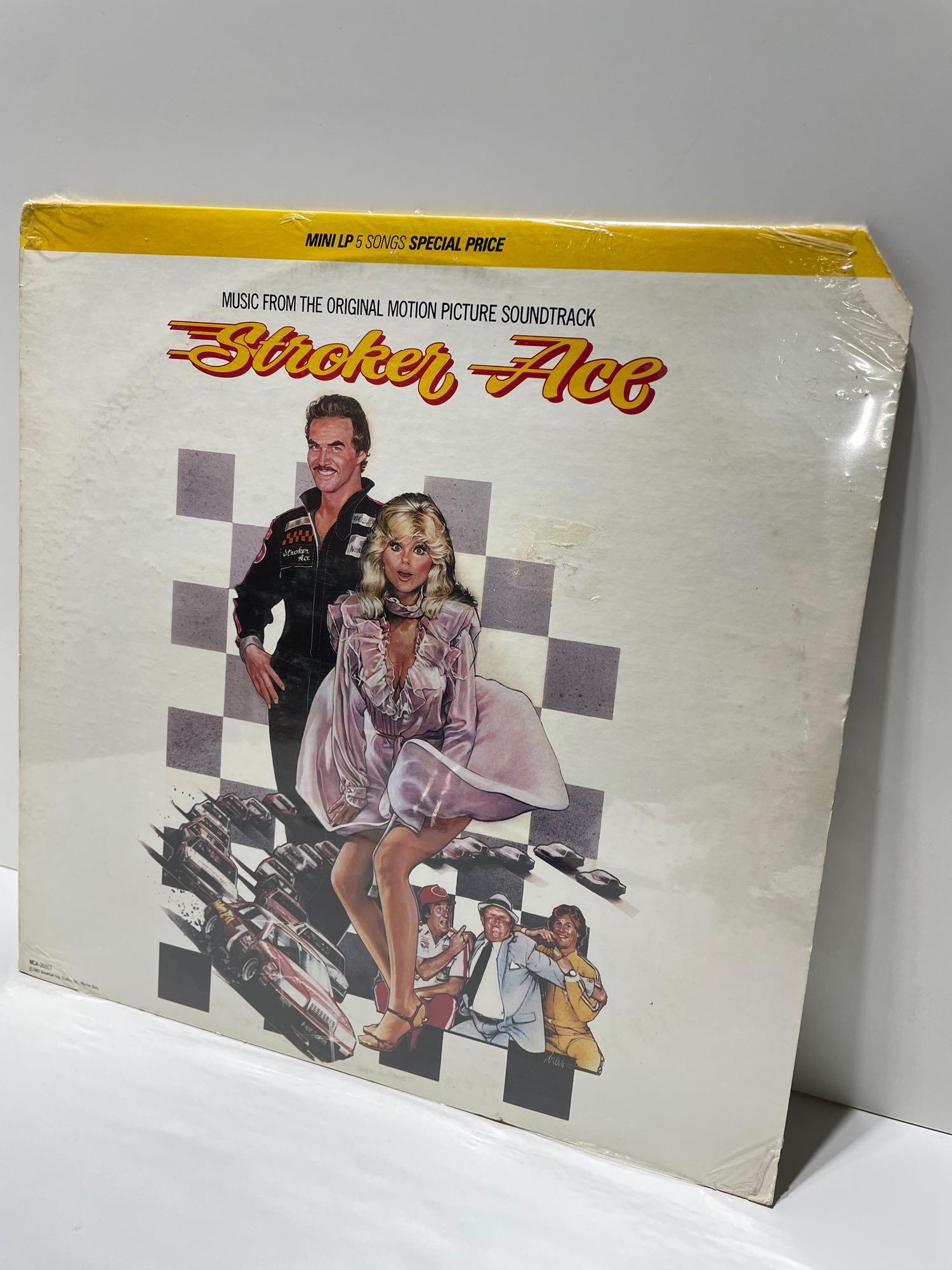 Stroker Ace Motion Picture sealed Soundtrack Vinyl LP MCA 1983 Marshall Tucker Promo: Stroker Ace Motion Picture sealed Soundtrack Vinyl LP MCA 1983 Marshall Tucker Please see all photos for condition. Sealed but plastic has a few tears. One corner cropped