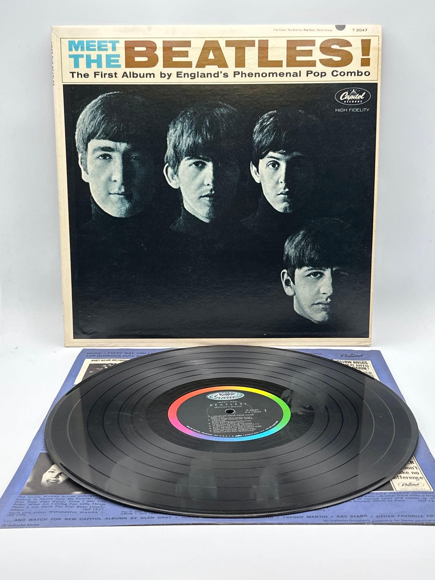 MEET THE BEATLES! CAPITAL T- 2047 MONO VINYL LP: MEET THE BEATLES! CAPITAL T- 2047 MONO VINYL LP 12”. “First album by England’s phenomenal Pop combo!” Please review pictures