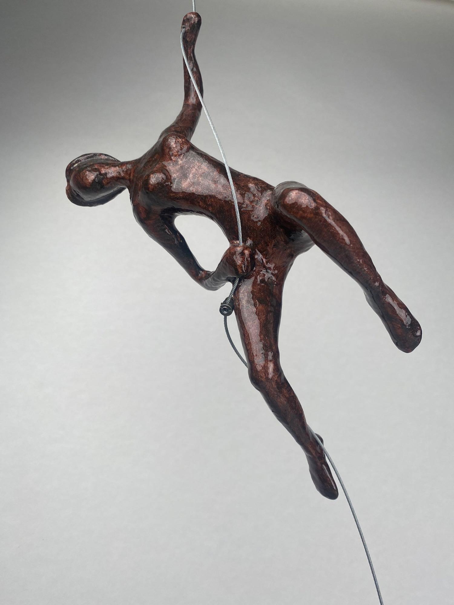 Pair of Ancizar Marin Wall-Climbers: Ancizar Marin wall climbers, set of two. These two pieces are made of a fiberglass with a brown resin finish. They come with steel wire to be posed in a variety of positions. They are both in very goo