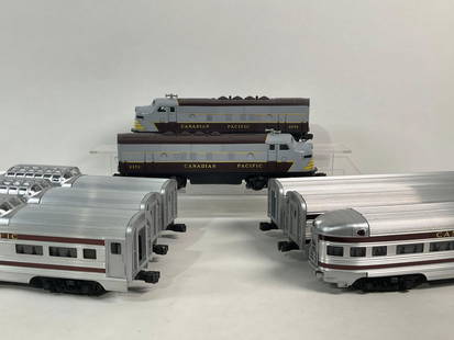 LIONEL #2373 CANADIAN PACIFIC F3 AA SET: LIONEL #2373 CANADIAN PACIFIC F3 AA SET Vintage locomotive train set, produced only in 1957. This set includes two (2) AA Lionel No. 2373 Canadian Pacific F3 units and six (6) passenger cars. The six