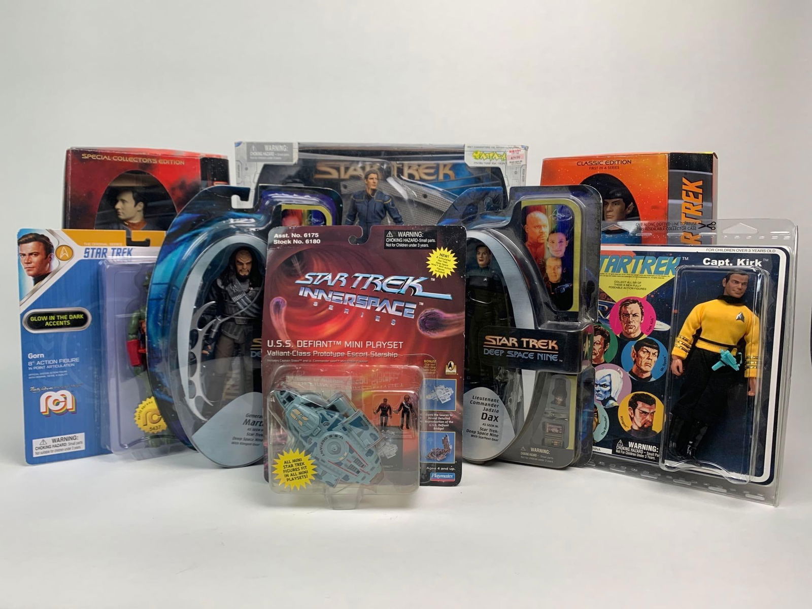 Lot of Star Trek Action Figures (Deep Space Nine, Original Series, Enterprise, and More): Lot of Star Trek Action Figures (Deep Space Nine, Original Series, Enterprise, and More) All Figures come in an original box. Boxes show signs of wear commensurate with age. Please see photos for addi