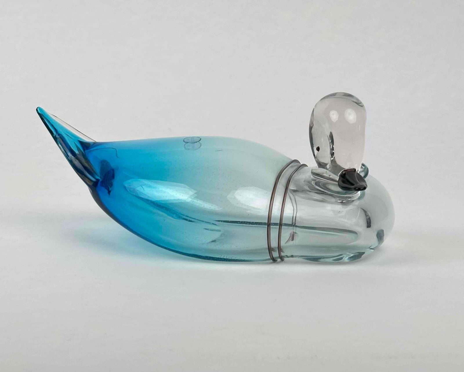 RARE Luigi Mellara signed Murano Duck: RARE Luigi Mellara signed Murano Duck. Glass duck is signed to underside by Luigi Mellara and boasts a Murano sticker. This duck measures aprox 10" from tip to tail and is free from any chips or d