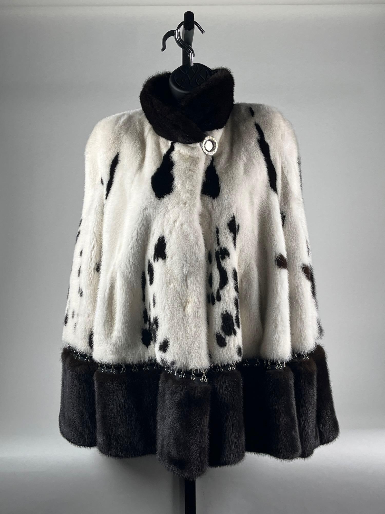 Kopenhagen Fur (Bricker-Tunis Furrier) Black and White Mink Coat: Kopenhagen Fur (Bricker-Tunis Furrier) Black and White Mink Coat: Bricker-Tunis West Bloomfield. Black and white mink, silk-lined with a monogram. Button Close. No size tag. Estimated at a 44. Conditi