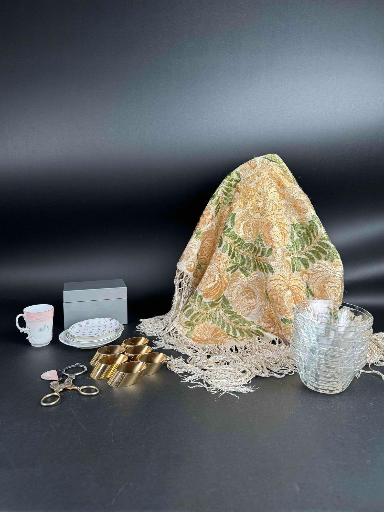 Mixed Lot of 7 Vintage/Antique Items: Lot of vintage/antique items ranging from 19th-20th century. All items are in good condition. Please see photos for additional details. Lot includes: 6 Gold tone napkin rings 1 Egg Slicer Floral embr